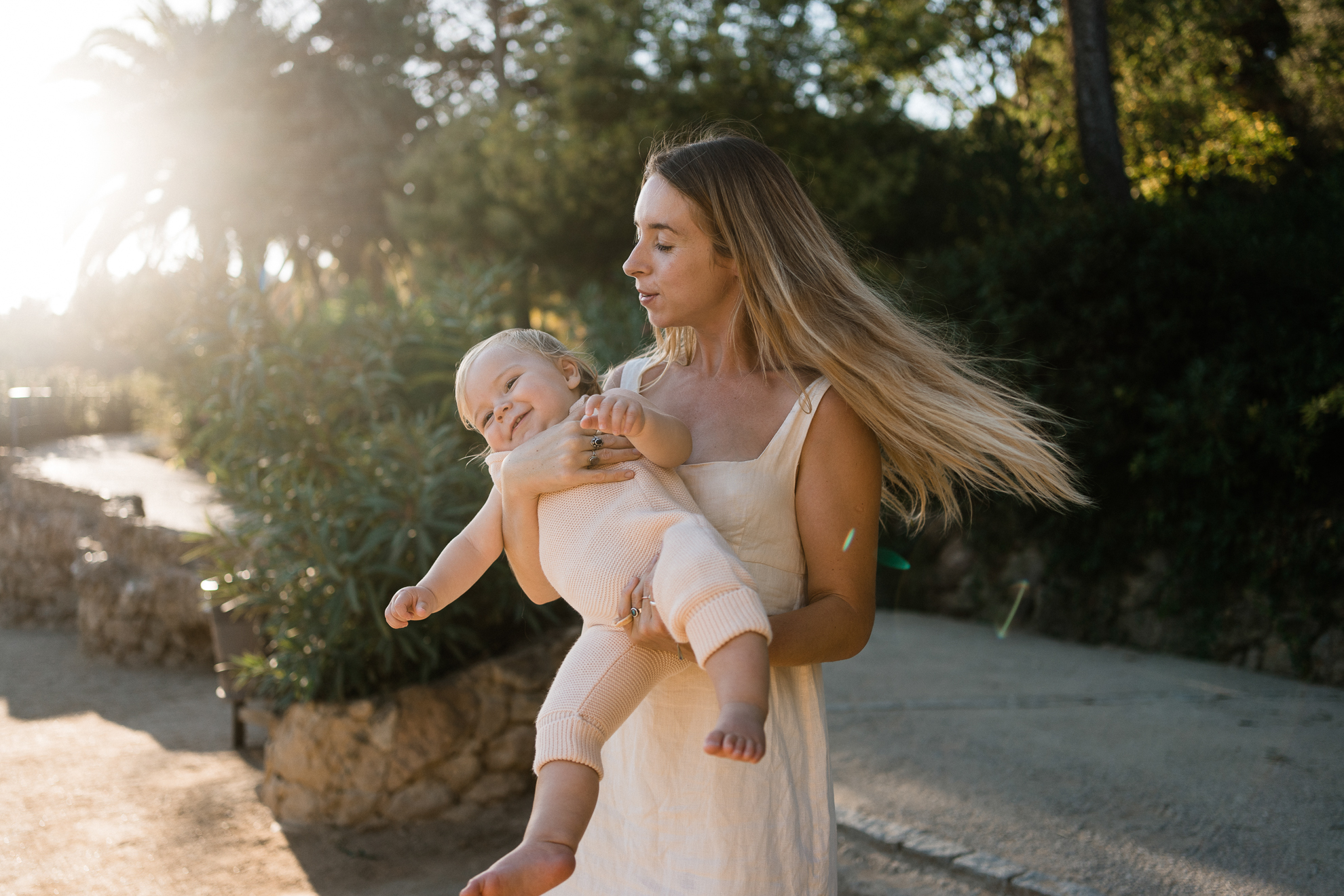 Mother and son playing in Parc Güell during a photoshoot in Barcelona